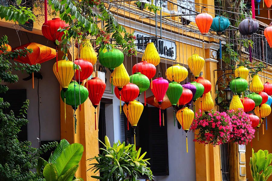 Walking the streets and taking photos at the traditional yellow walls in Hoi An