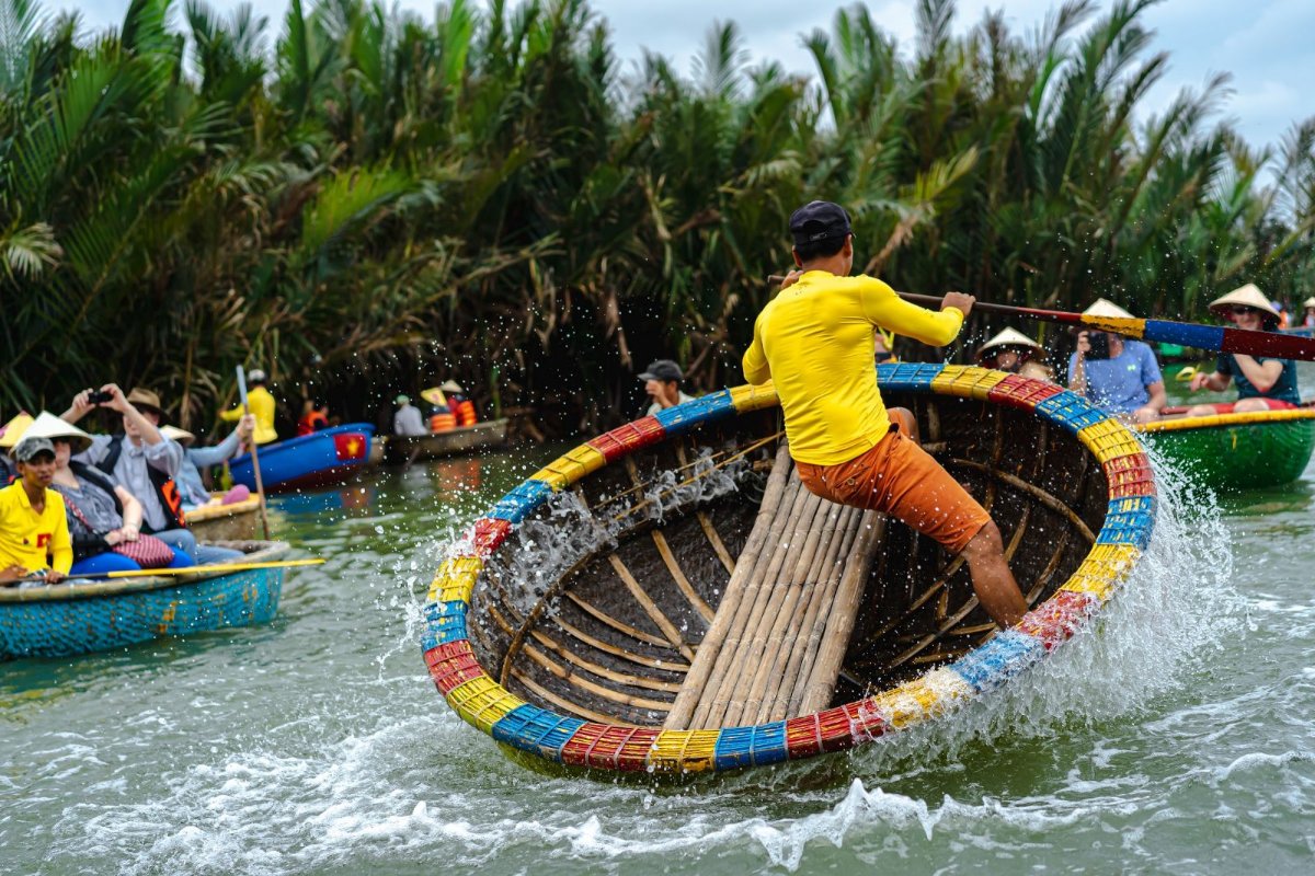 A basket boat performance on the river at the coconut forest