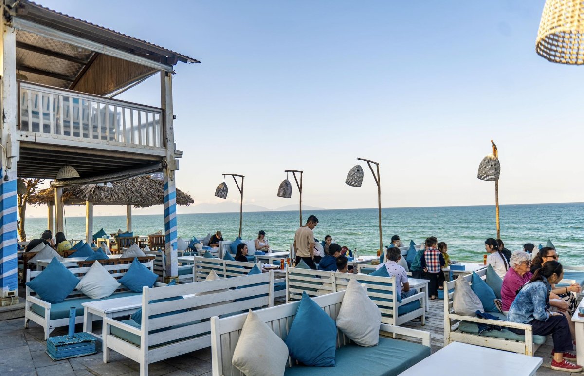 The signature white and blue space makes The Deck House stand out in An Bang
