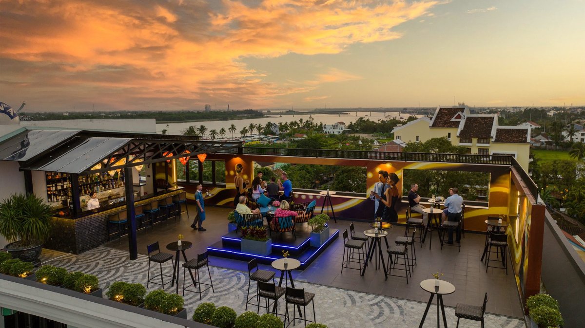 Watch Hoi An light up from the airy rooftop at Deli Sky Bar