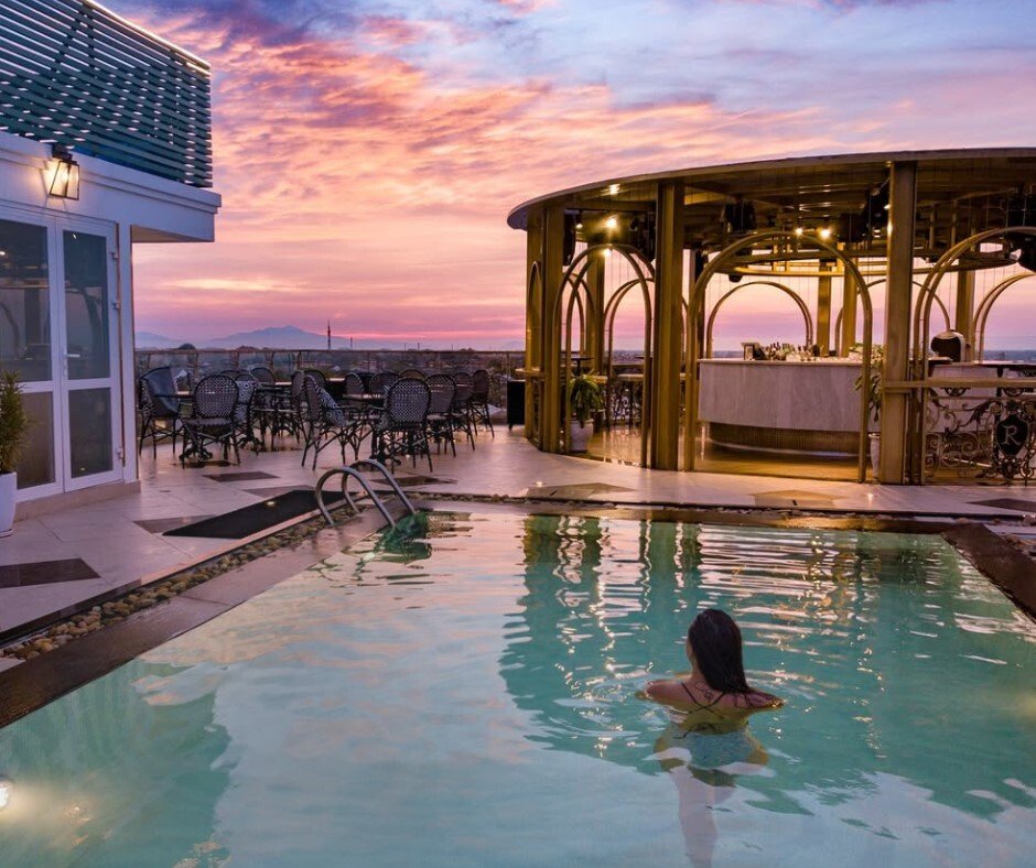 Enjoying the sunset view by the infinity pool